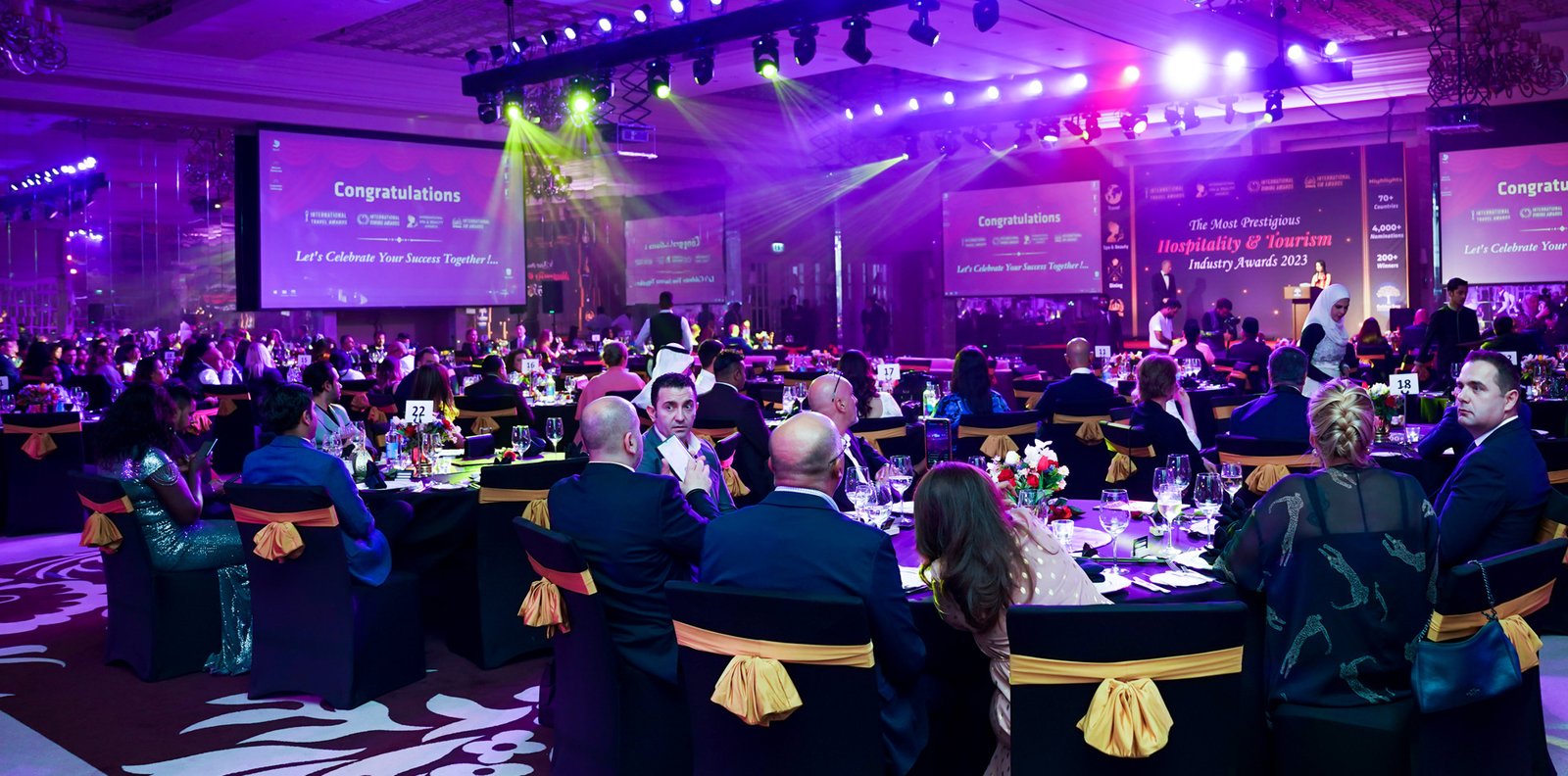 Awards trophy presentation at a Dubai gala evening