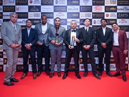 Delegates gathered for a group photograph at an awards gala